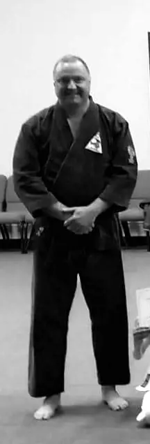 Robbie Gorringe in a black karate uniform